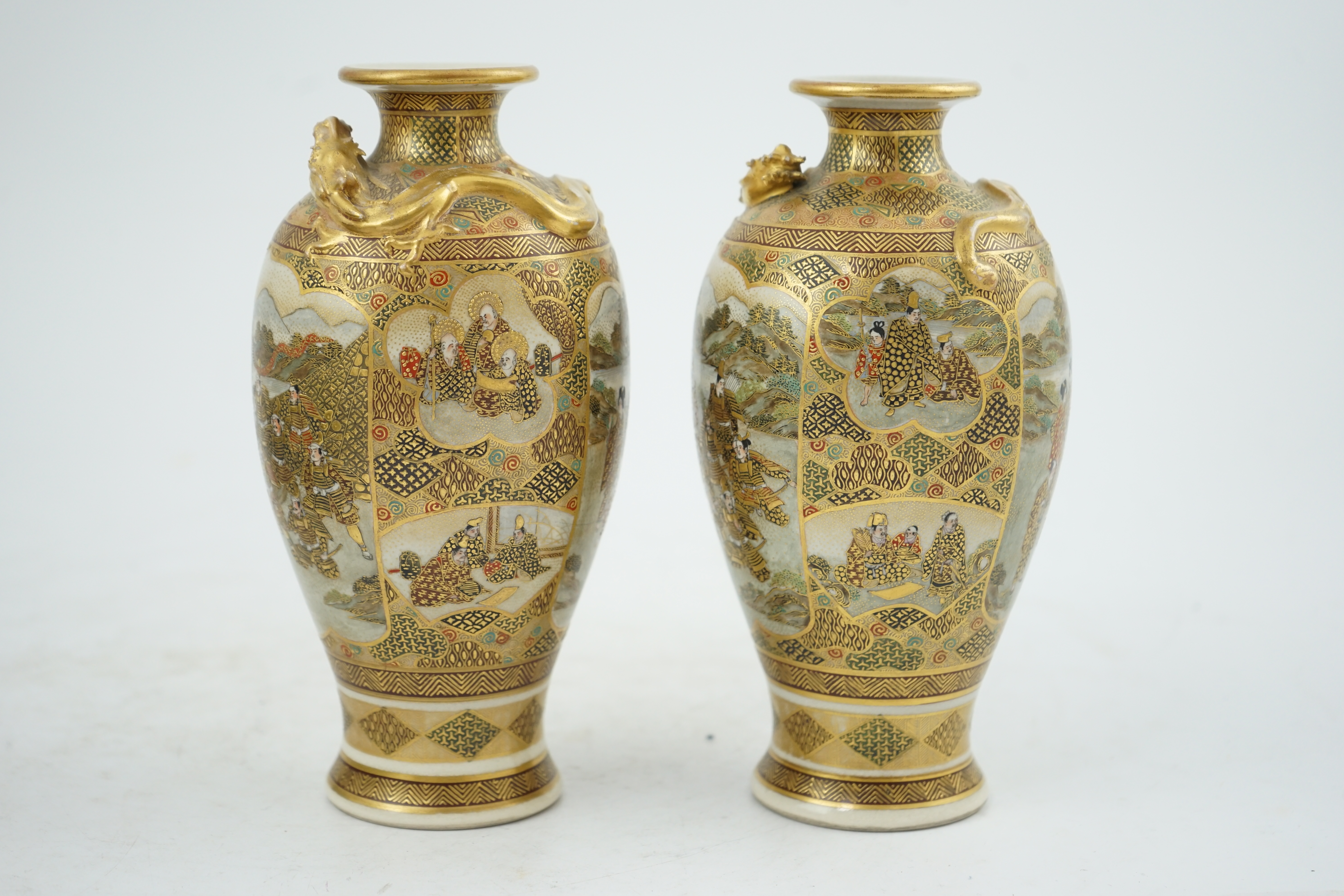 A pair of Japanese Satsuma 'dragon' vases, Meiji period